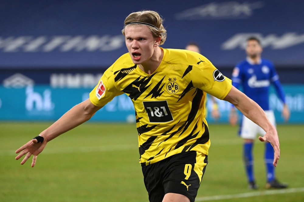 Penyerang Borussia Dortmund saat melakukan selebrasi di Gelsenkirchen, (20/02). AFP/INA FASSBENDER